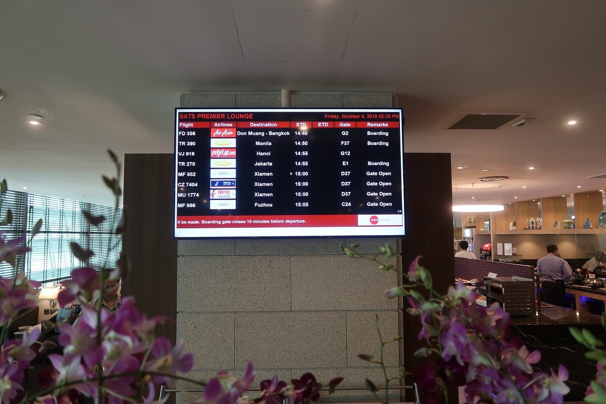 SATS Premier Lounge Terminal 2 Singapore Airport departures board