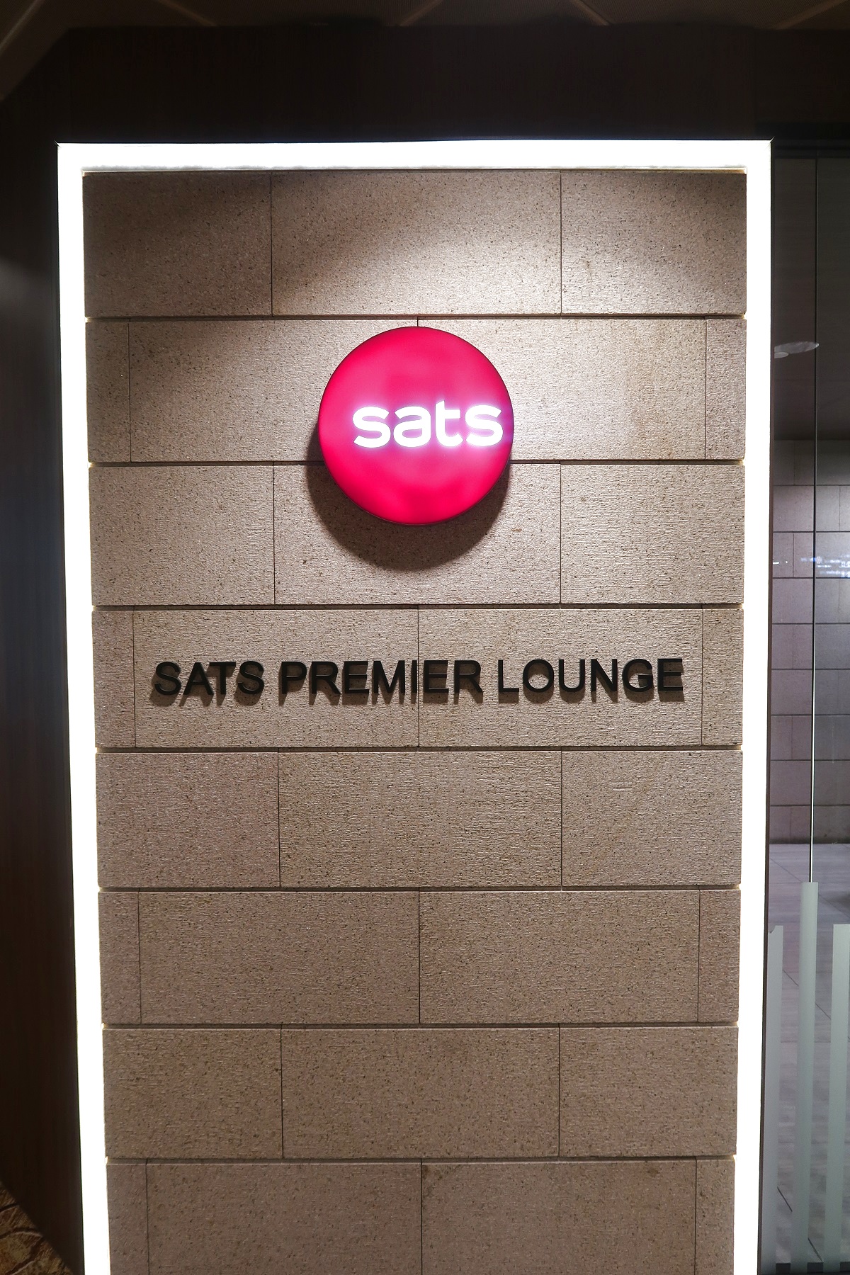 SATS Premier Lounge Terminal 2 Singapore Airport sign